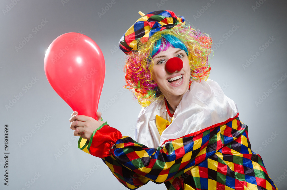 Clown with balloons in funny concept Clown with balloons in funny concept