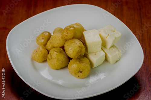 Closeup freshly prepared balls of green banana and pieces fresh