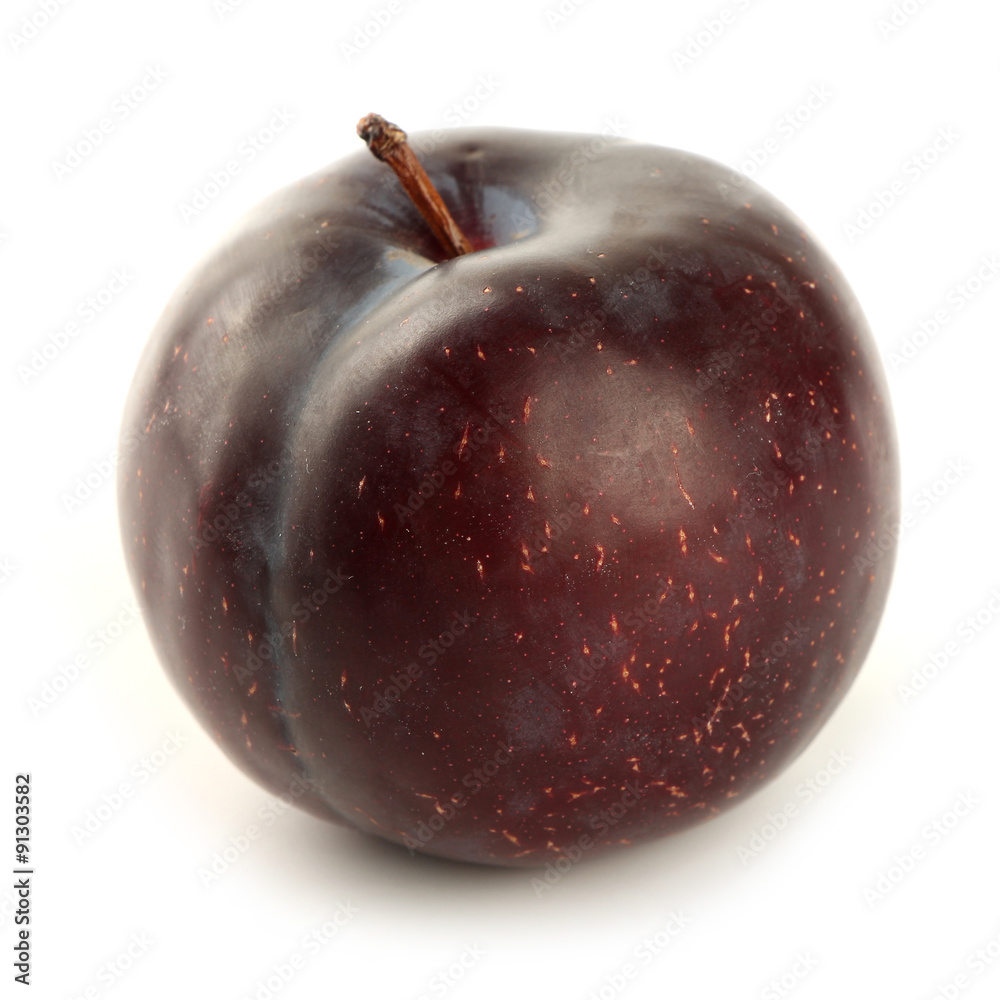 Fresh plum isolated on white