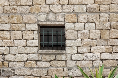 Old White Stonewall With Lattice Window Detail Background