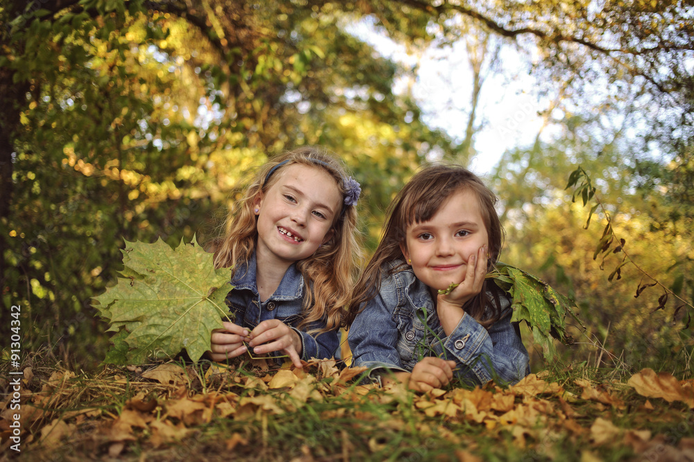 two friends having fun in autumn sunny day two friends having fun in autumn sunny day
