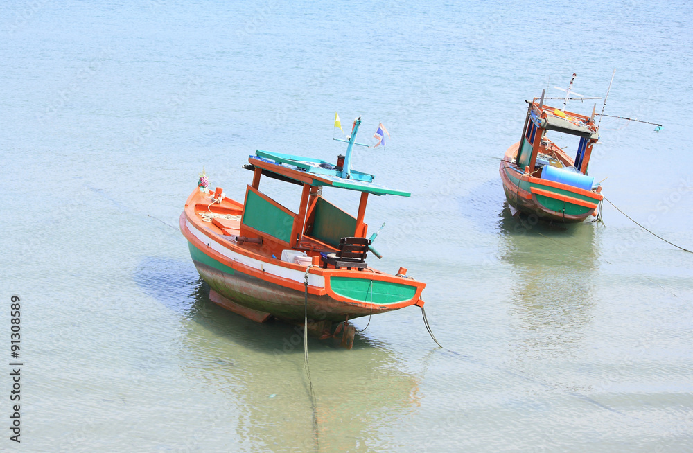 Fototapeta premium Small fishing boats near the island