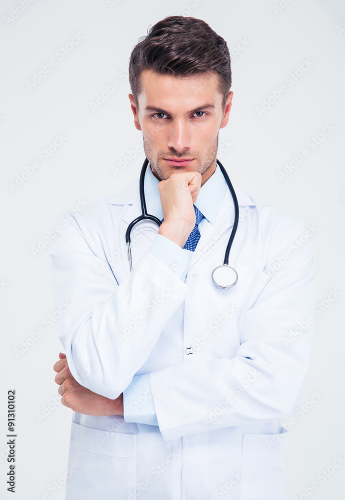 Portrait of a pensive male doctor looking at camera Portrait of a pensive male doctor looking at camera