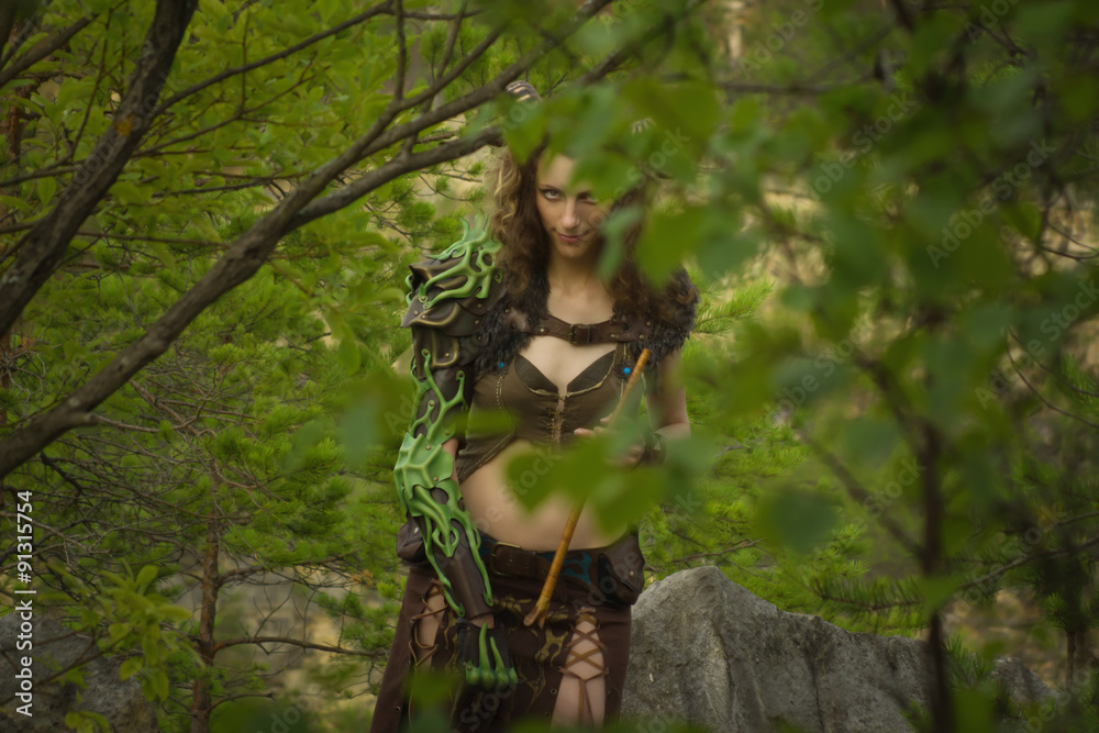 Pretty female faun in a wood Pretty female faun in a wood