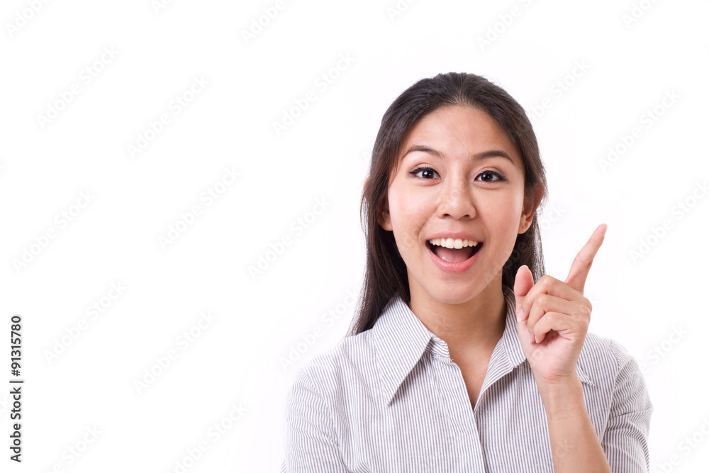 happy woman pointing her finger up happy woman pointing her finger up