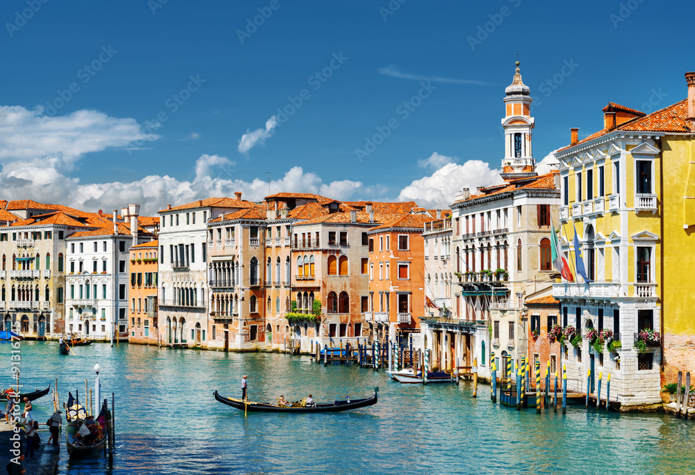 The Grand Canal with gondolas and colorful houses, Venice, Italy