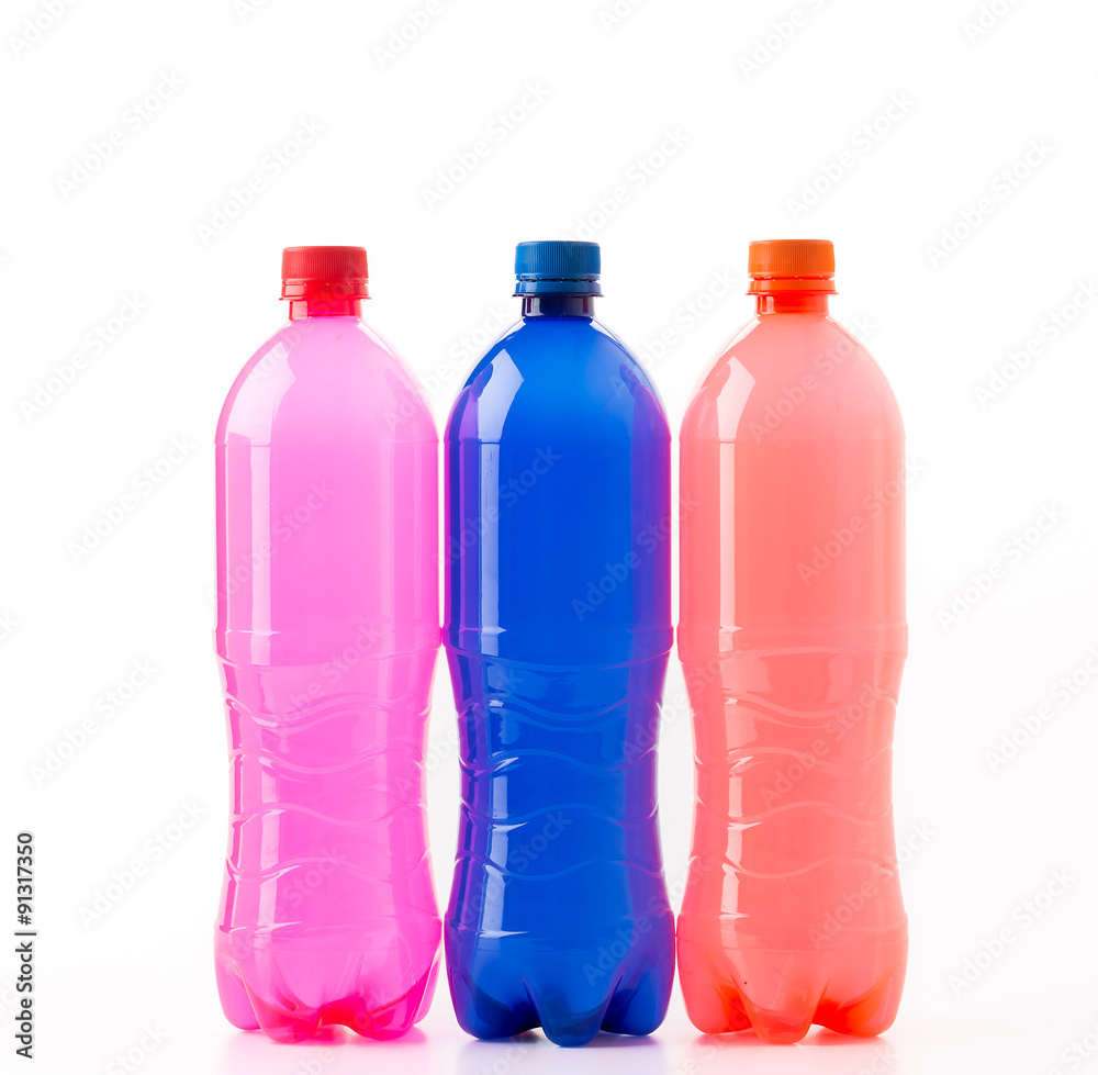 Bottles of soft drinks on white background Bottles of soft drinks on white background