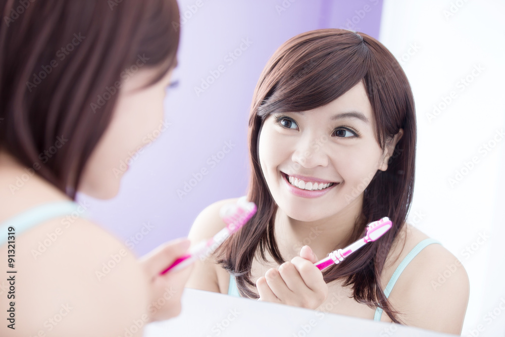 Smile woman brush teeth