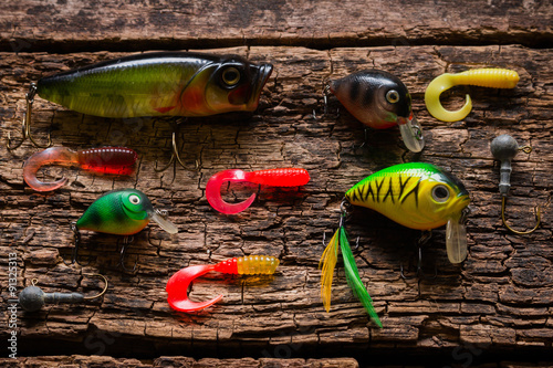 bait to catch fish on a wooden background