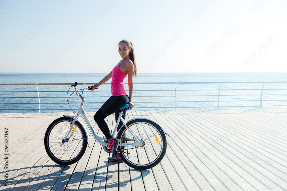 Woman on bicycle outdoors