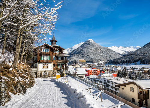 Wood chalet over landscape of  Davos, Switzerland. photo