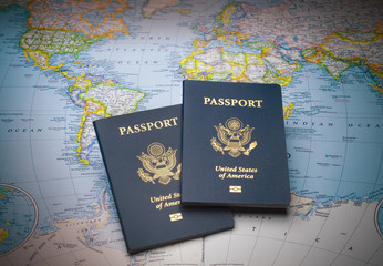 Travel passports on a world map ready for any exotic destination