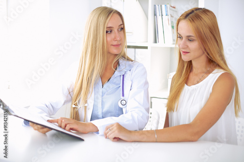 Doctor with patient in hospital