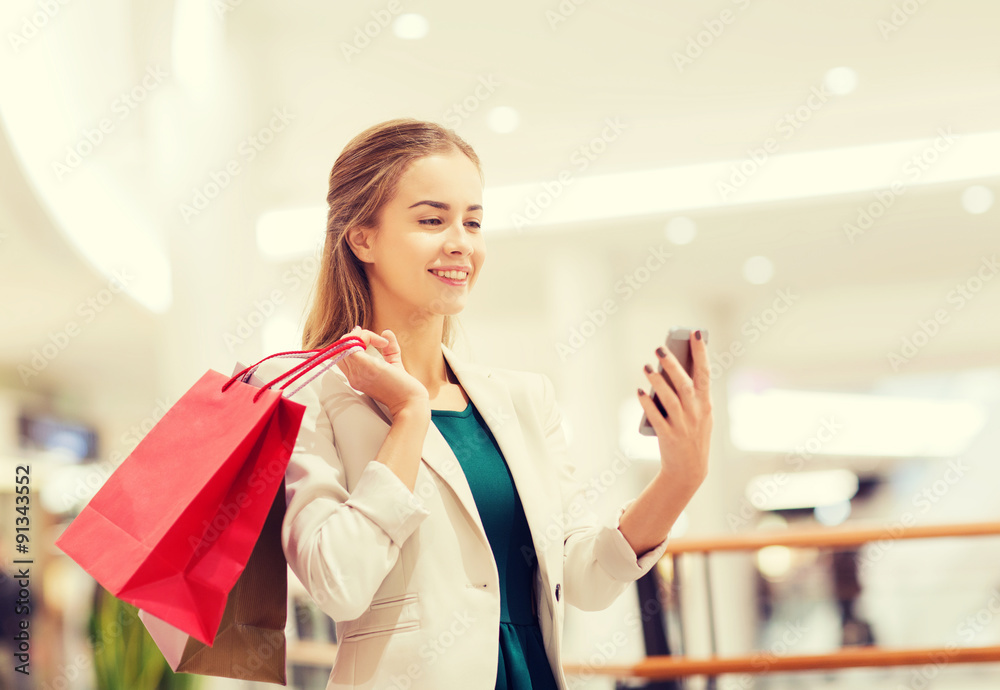 woman with smartphone shopping and taking selfie woman with smartphone shopping and taking selfie
