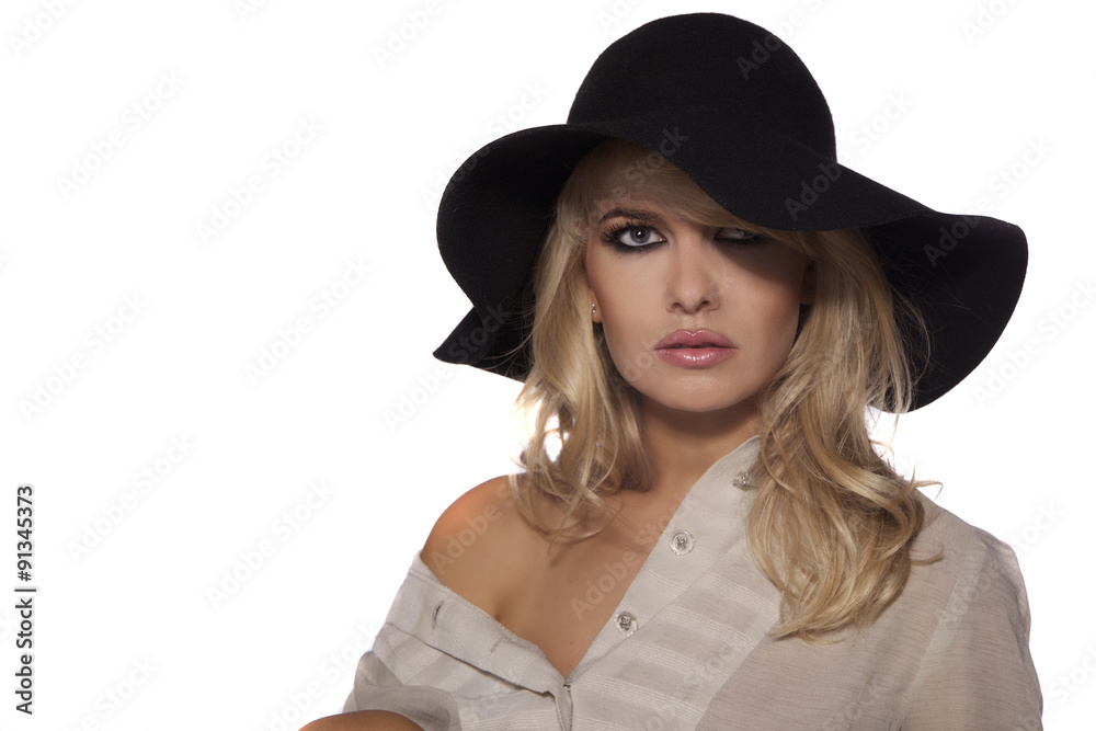 portrait of a beautiful blonde in retro style isolated on white background. in black hat portrait of a beautiful blonde in retro style isolated on white background. in black hat