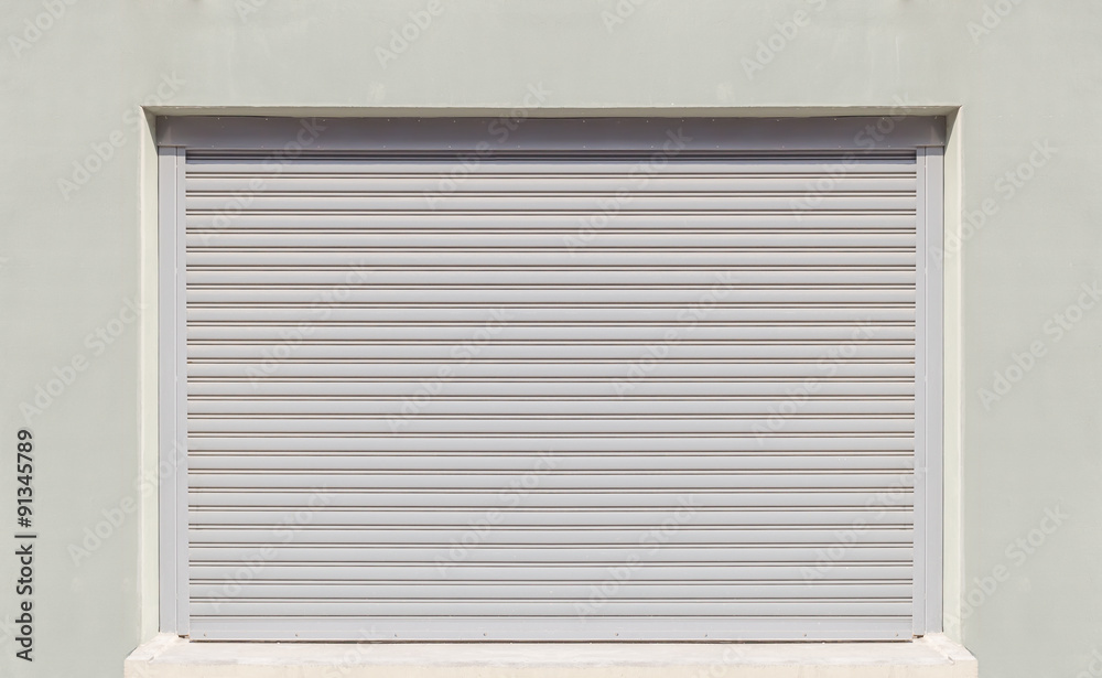Storefront or shopfront is a facade or entryway of retail store. Protection with security door also called roller door or roller shutter. Motorised type by automatic operation with electrical power. Storefront or shopfront is a facade or entryway of retail store. Protection with security door also called roller door or roller shutter. Motorised type by automatic operation with electrical power.