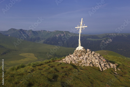 cross on top of mountain auvergne