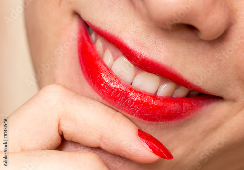 red manicure and red lips