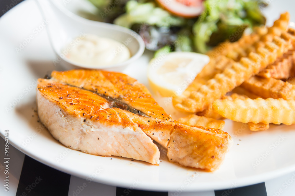 Grilled salmon steak - selective focus point Grilled salmon steak - selective focus point