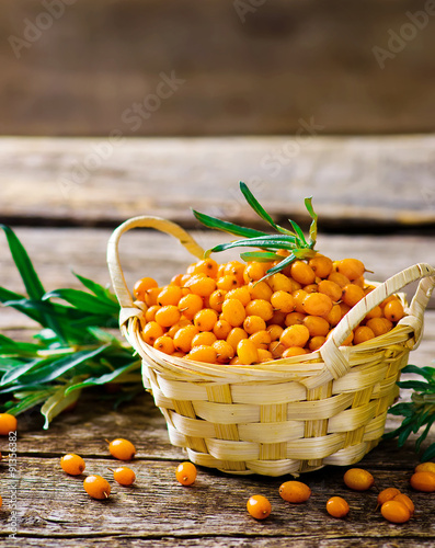 berries of an organic sea-buckthorn in a basket