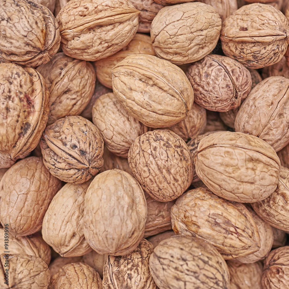 organic walnuts close up, vegan food background organic walnuts close up, vegan food background