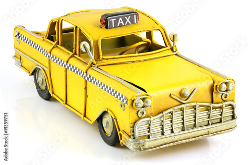 Old toy yellow taxi