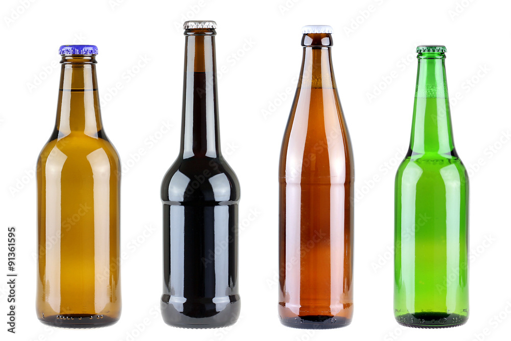 four differen beer bottles isolated on white four differen beer bottles isolated on white