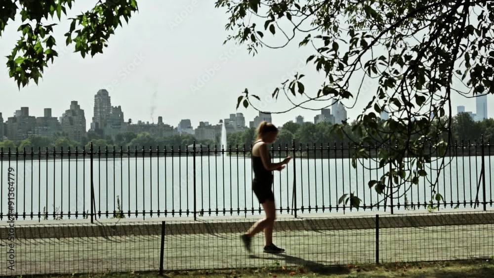 Joggers and runners keeping fit in Central Park, New York. Joggers and runners keeping fit in Central Park, New York.