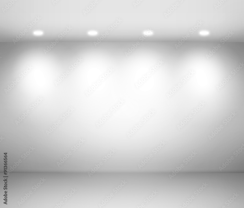 Empty space - empty wall in a room with light spots.