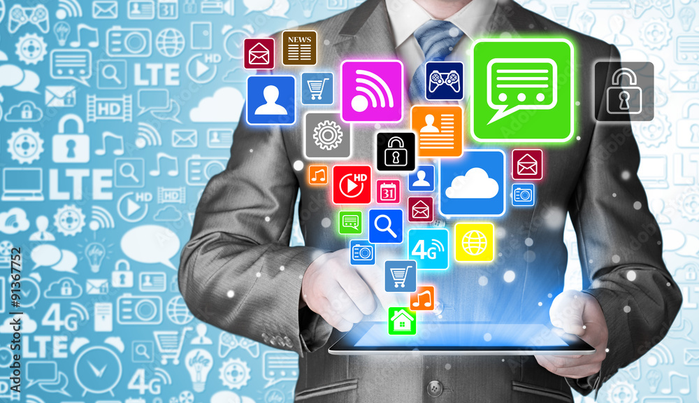 Business man using tablet PC with social media icon set Business man using tablet PC with social media icon set
