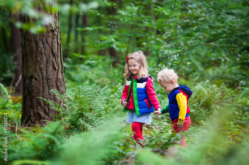 Kids hiking in autumn park © famveldman