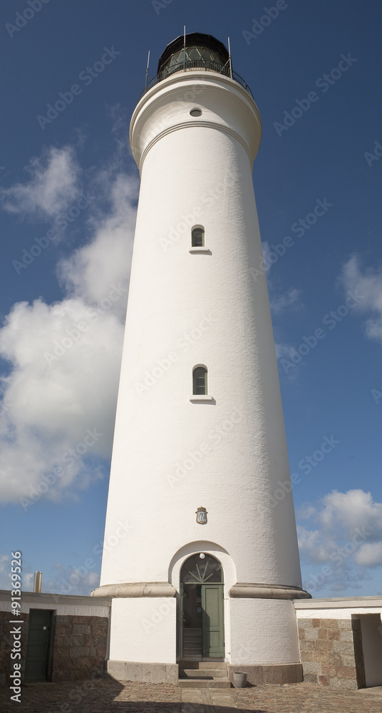 Looking Up. An image looking up a grand old lighthouse emphasizing it height and style.