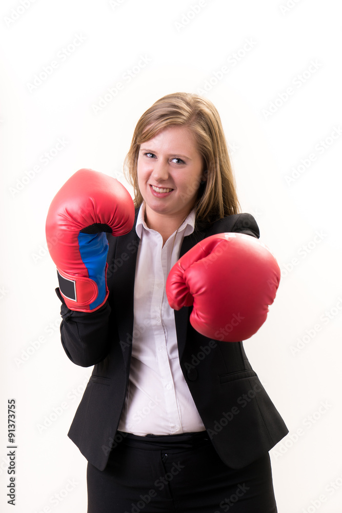 Success business concept: businesswoman with boxing gloves Success business concept: businesswoman with boxing gloves