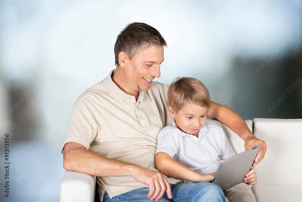 Using tablet. Using tablet.