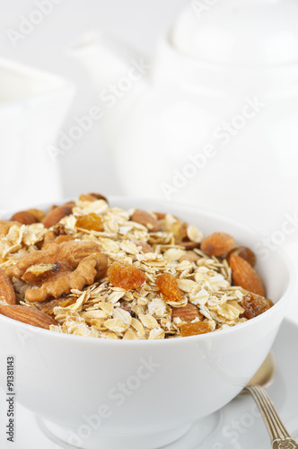 Oatmeal flakes with nuts in bowl