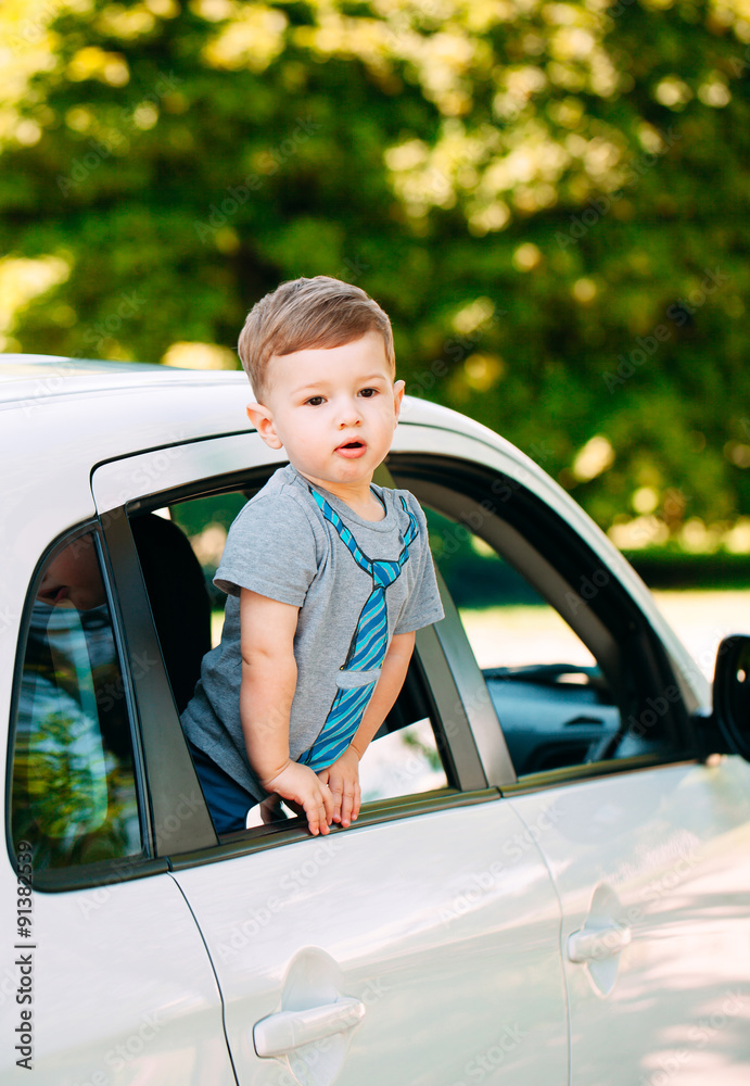 Adorable baby boy in the car Adorable baby boy in the car