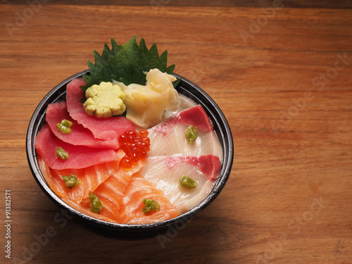 Hamachi, salmon and tuna sashimi on rice, donburi, japanese food
