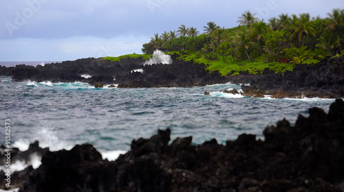 Waves Break Against Volcanic Rocks in Maui, Hawaii
