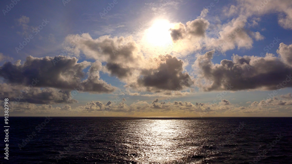 View of The Setting Sun Over the Pacific Ocean From The Deck of View of The Setting Sun Over the Pacific Ocean From The Deck of