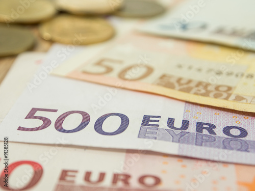 euro banknote and coin