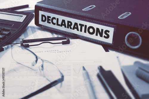 Declarations on Ring Binder. Blured, Toned Image. photo