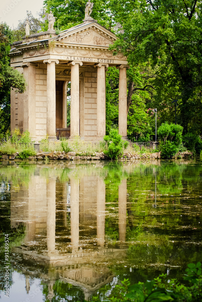 Villa Borghese gardens: the 19th century Temple of Aesculapius on a bank of a lake, built as a landscape feature and influenced by the lake at Stourhead in England. Villa Borghese gardens: the 19th century Temple of Aesculapius on a bank of a lake, built as a landscape feature and influenced by the lake at Stourhead in England.