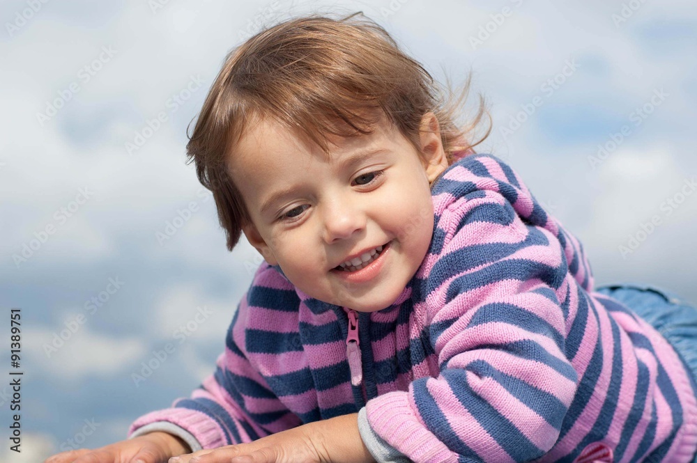 close-up portrait of a smiling little girl close-up portrait of a smiling little girl