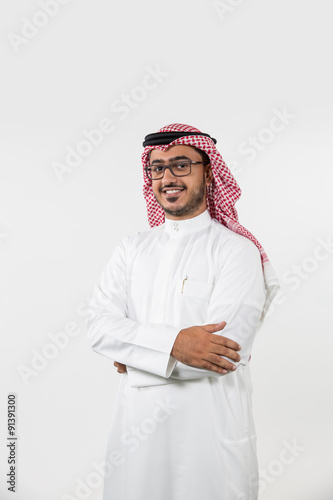 Portrait of Arab man with arms crossed. photo