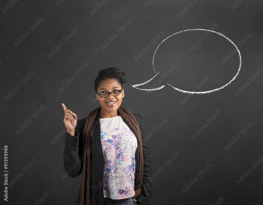 African woman good idea and speech bubble on blackboard background
