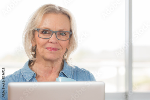 Blonde woman work desk