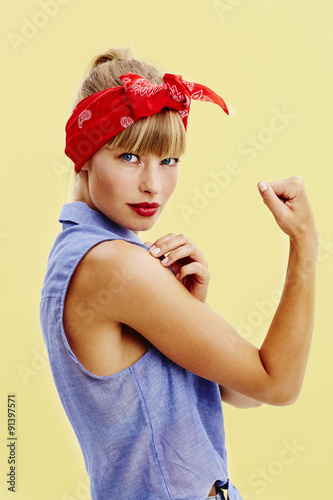 Powerful young woman in retro clothing, portrait