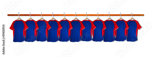 Row of Blue Football Shirts hanging on wall