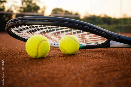 Tennis racket with balls © yossarian6