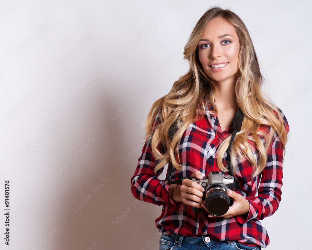 young hipster woman with digital camera smiling young hipster woman with digital camera smiling